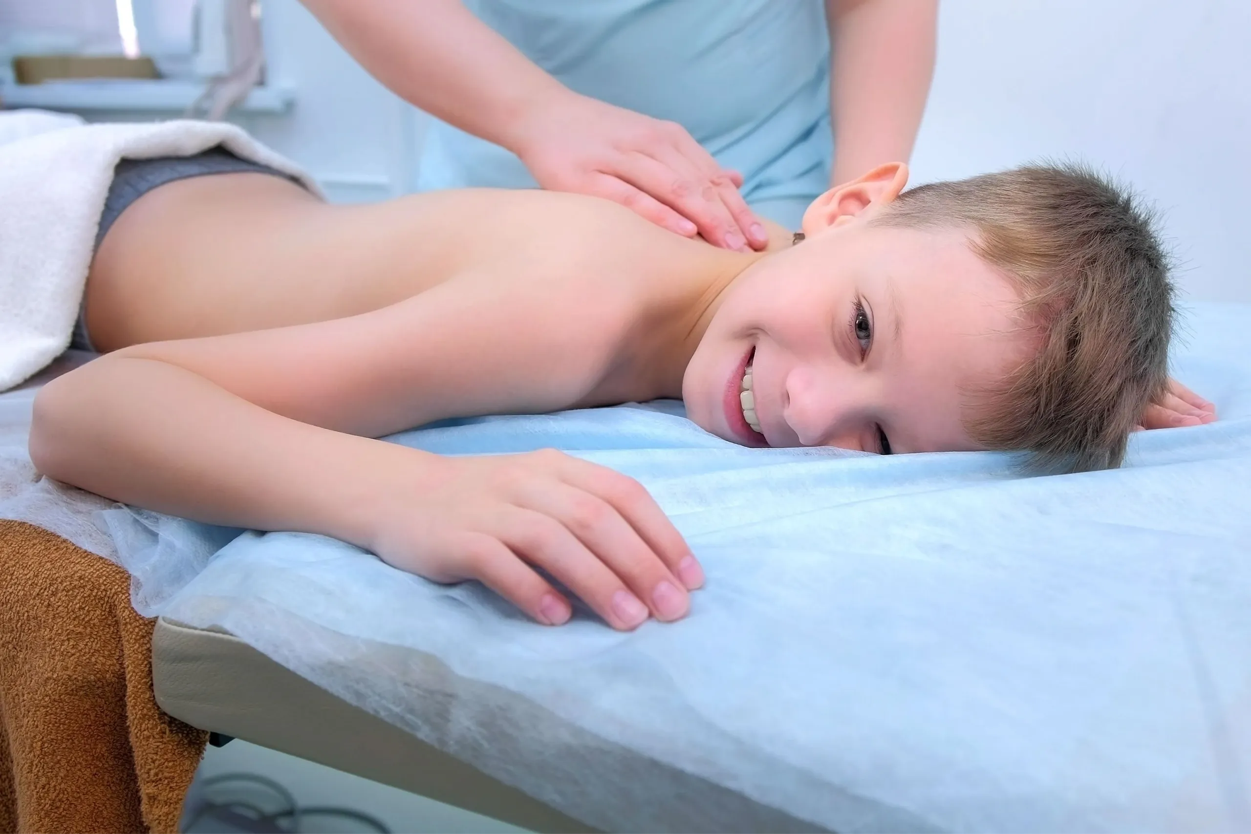 Child receiving gentle chiropractic adjustment at Bensa Chiropractic and Wellness in Bradenton FL