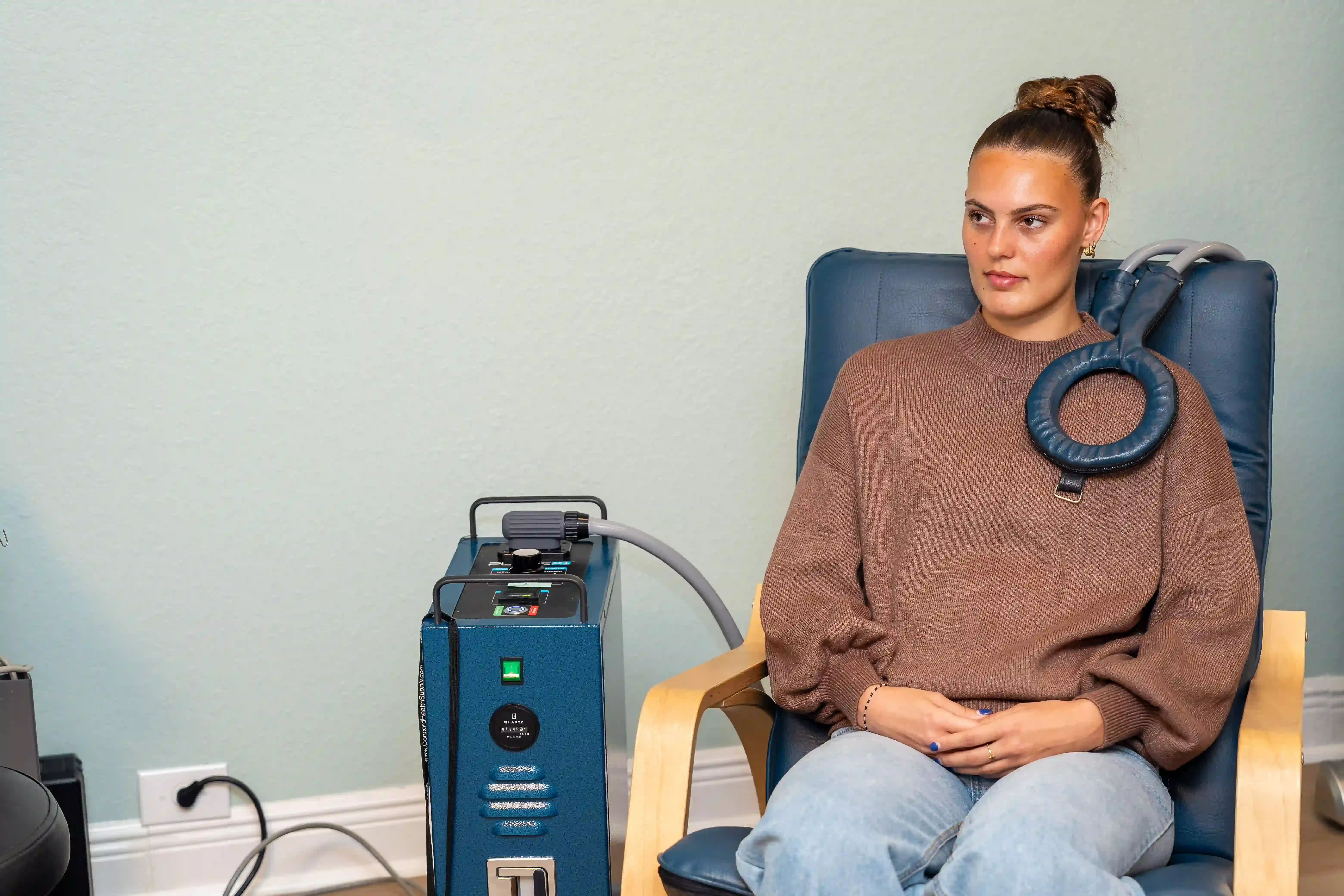 Patient receiving PEMF therapy treatment at Arise Integrative Wellness in Port Charlotte, FL
