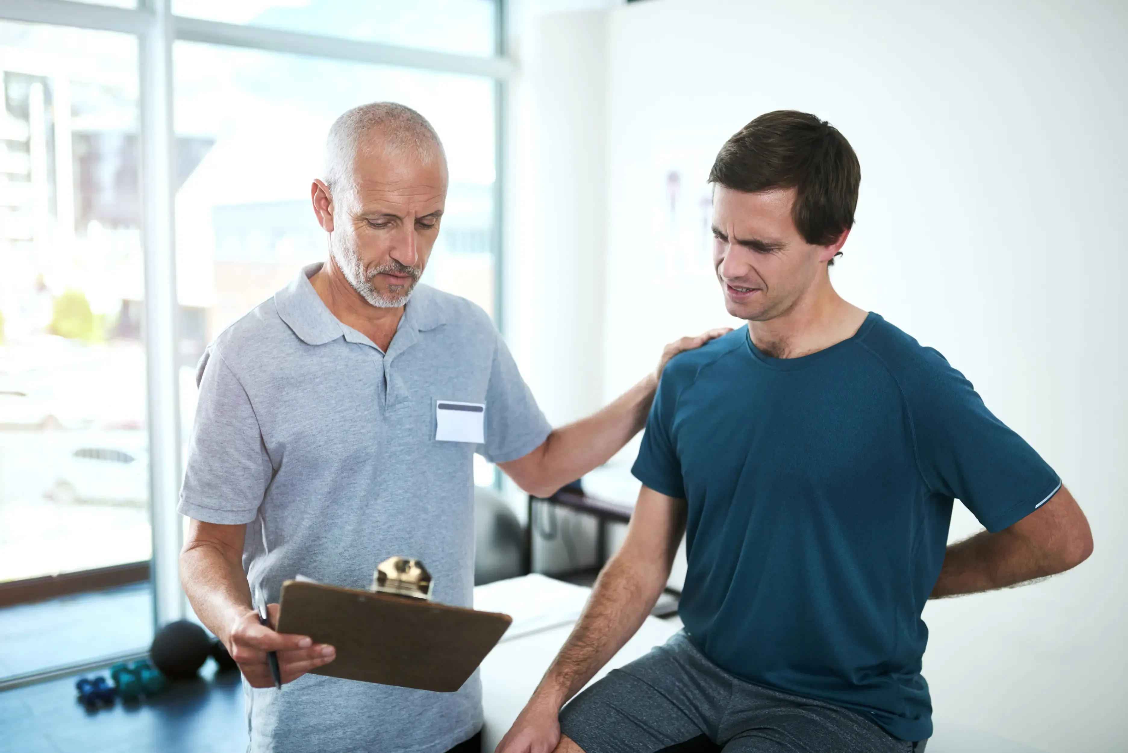 Car accident doctor evaluating an auto injury at Reliance Primary & Urgent Care in Jacksonville, FL