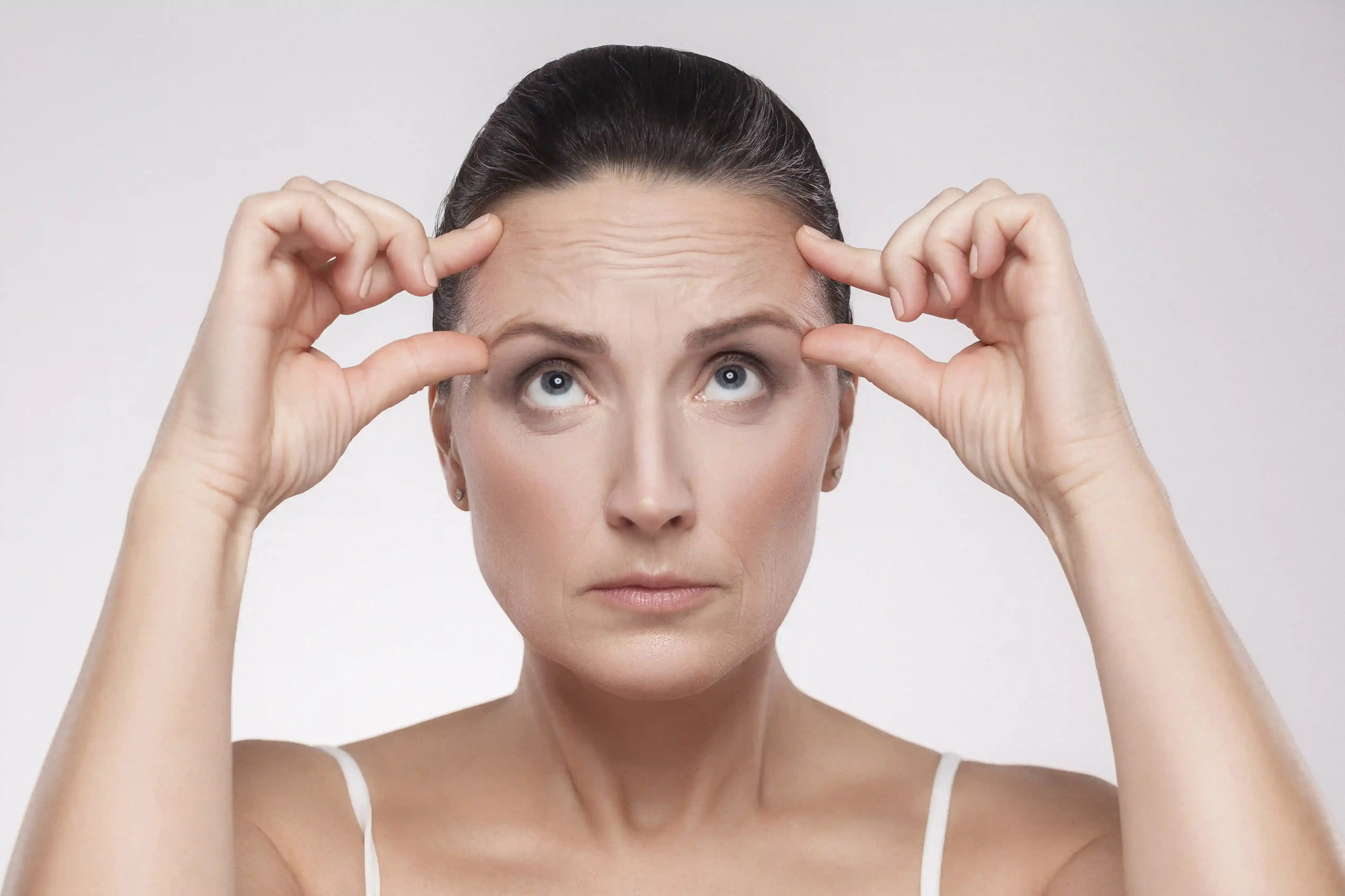 Lifestyle factors affecting forehead lines and frown lines at Heritage Wellness & Med Spa Crescent Springs