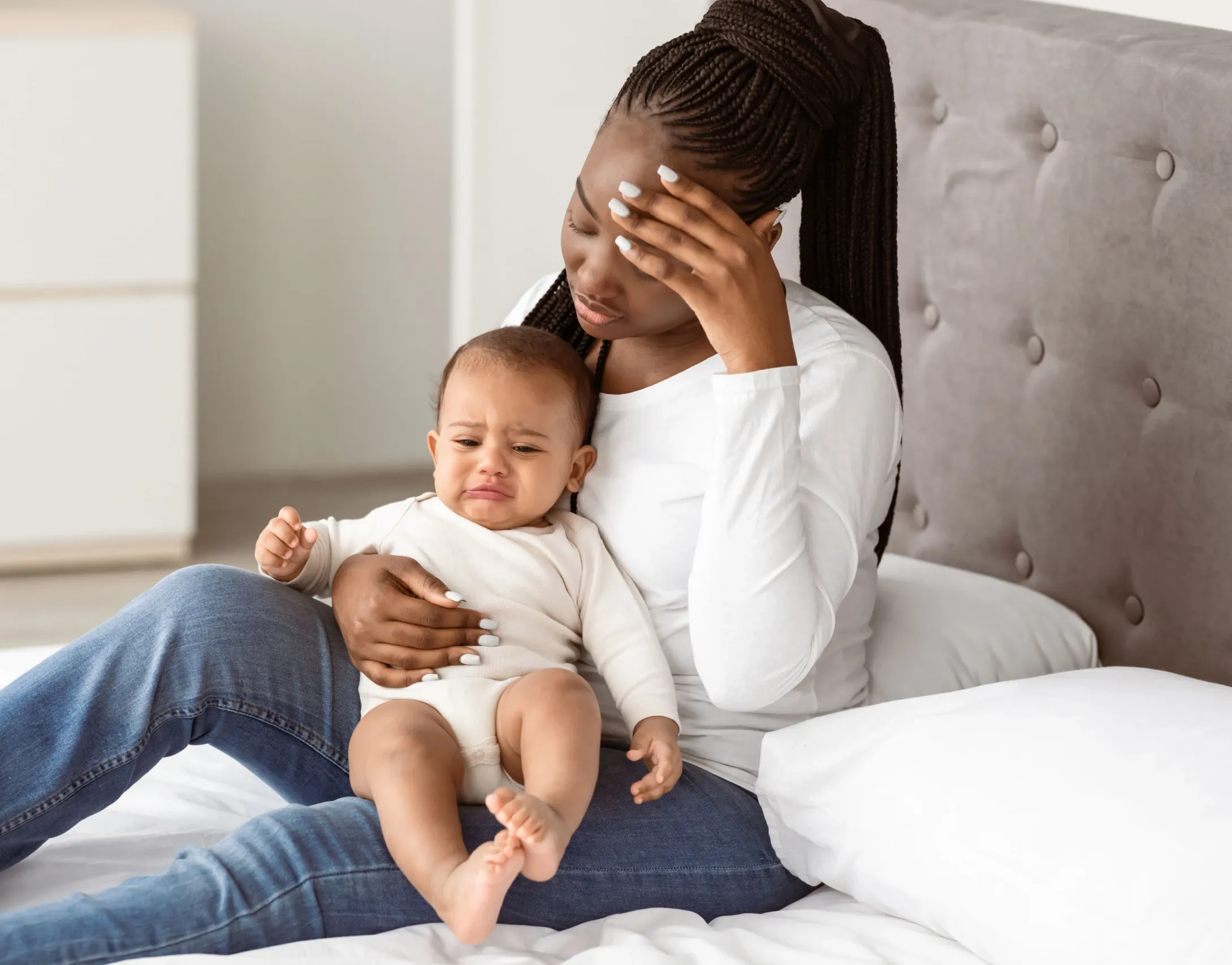 New mother experiencing relief from postpartum depression symptoms through treatment