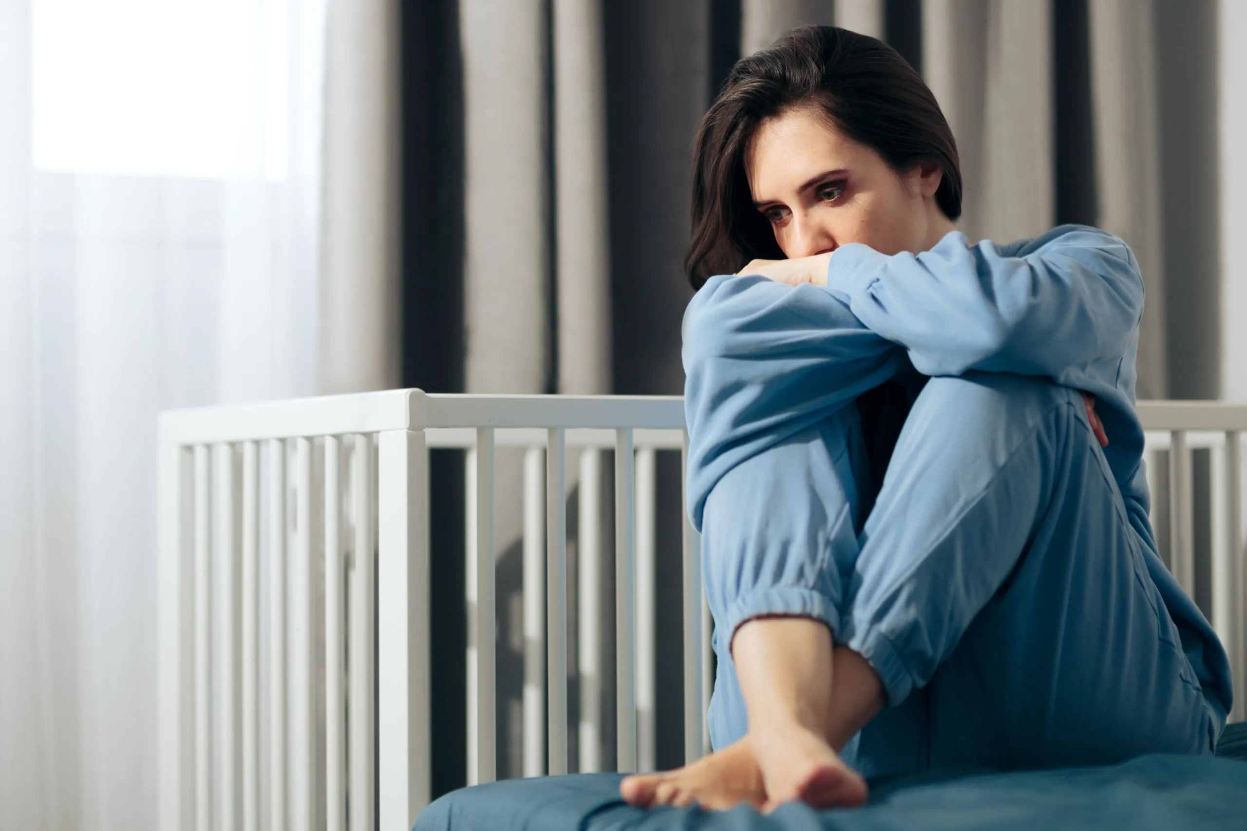 Mother receiving compassionate postpartum depression treatment at West Eastern Health in Ponte Vedra Beach