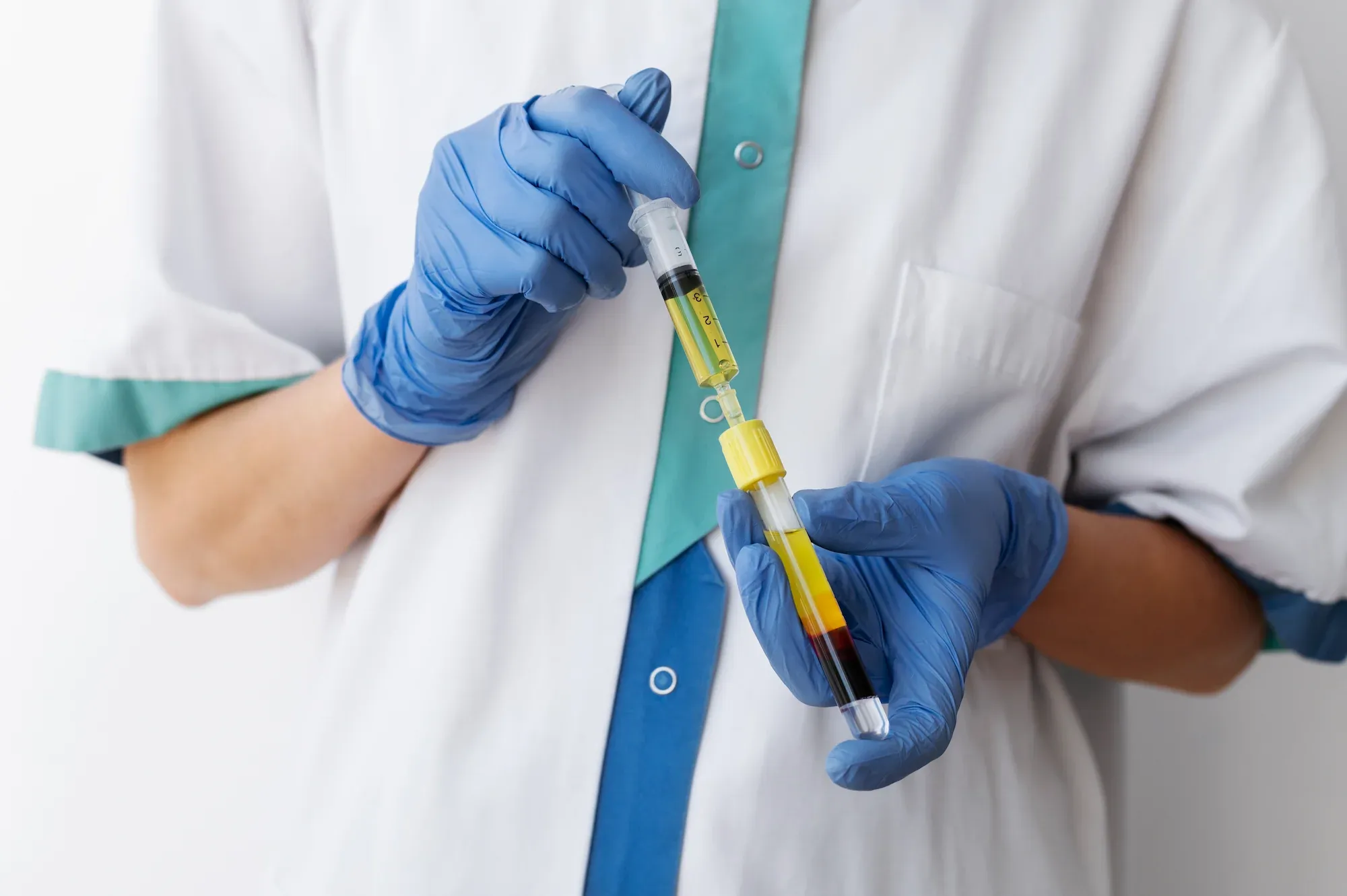 Cook Family Dentistry team preparing PRP from a patient's blood draw in Santa Rosa Beach, FL