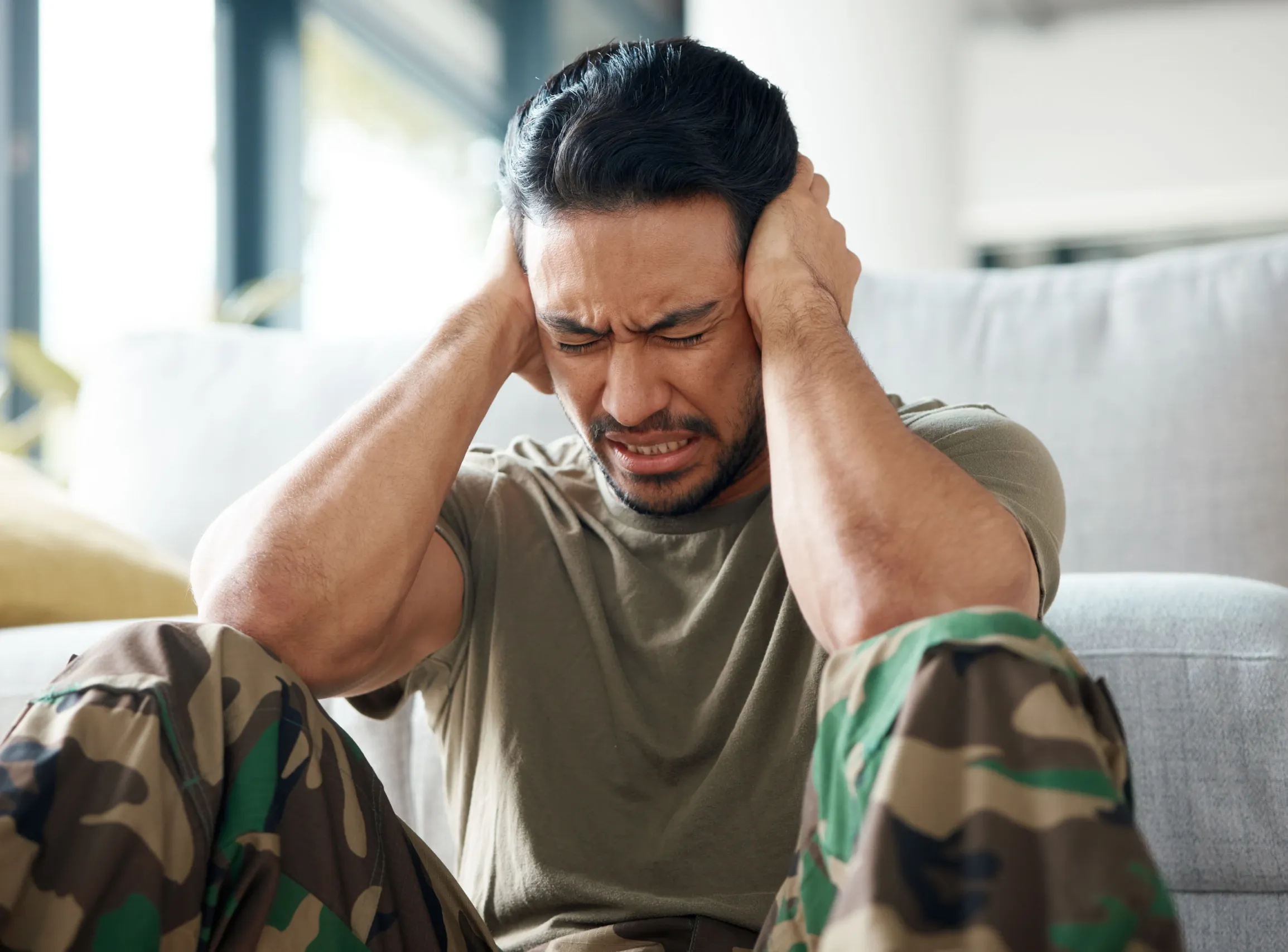 Person recognizing PTSD symptoms seeking help at West Eastern Health Jacksonville area