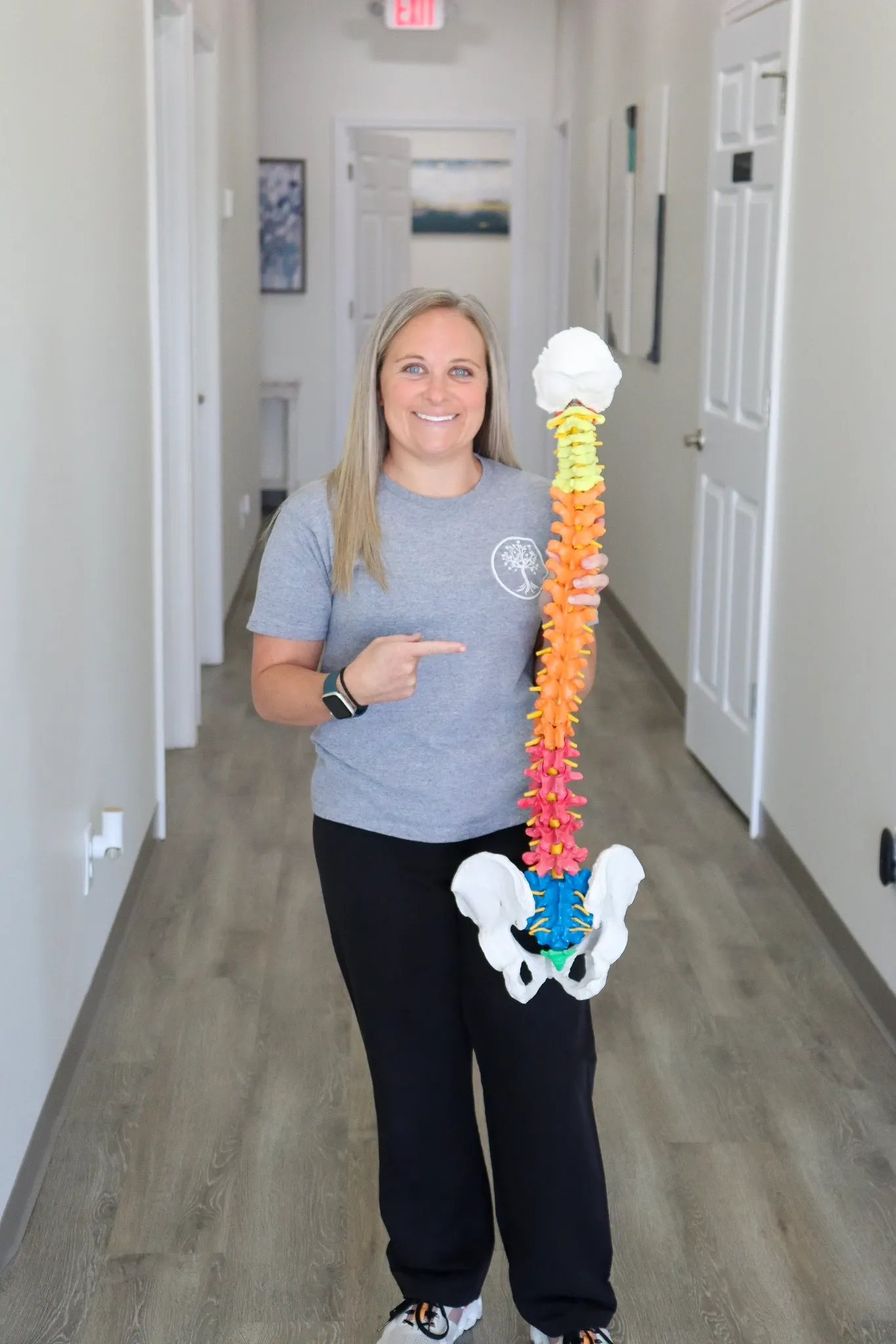 Dr. Hailey Tillman providing chiropractic care at Roots Chiropractic in Alma, GA