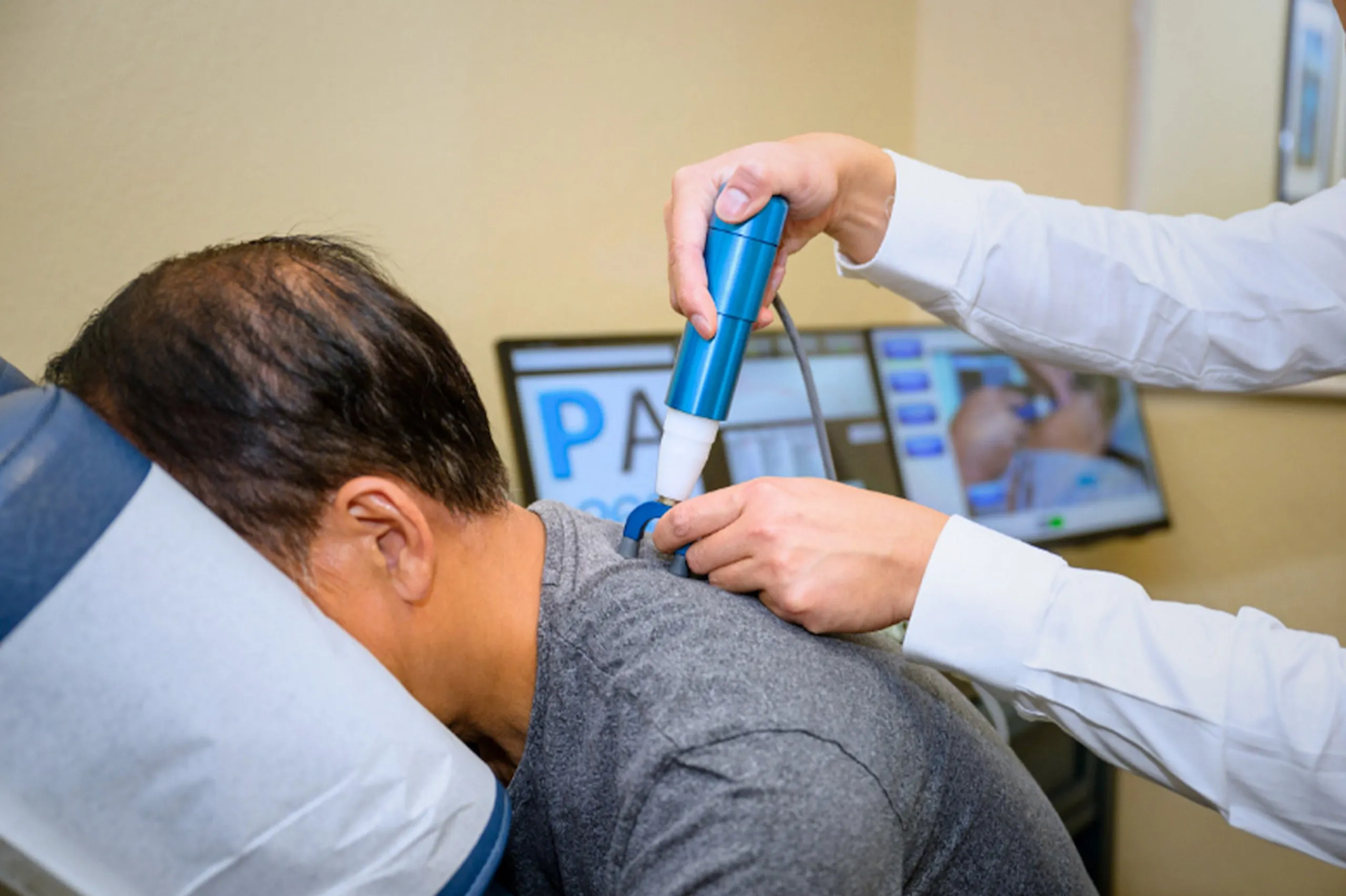 Chiropractic adjustment with ProAdjuster at ProActive Chiropractic in Tampa, FL