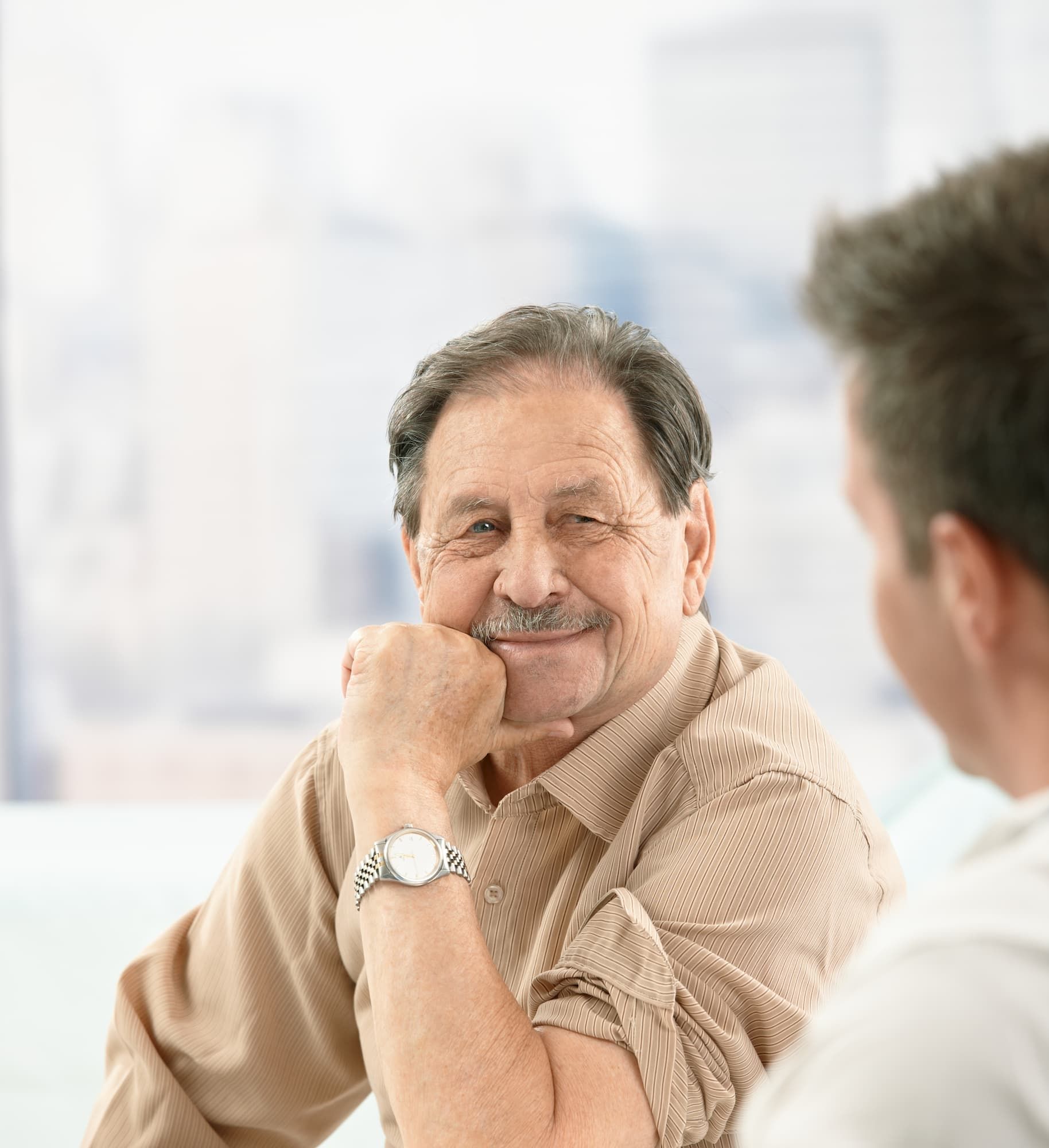 Person concerned about thyroid symptoms at Arise Integrative Wellness