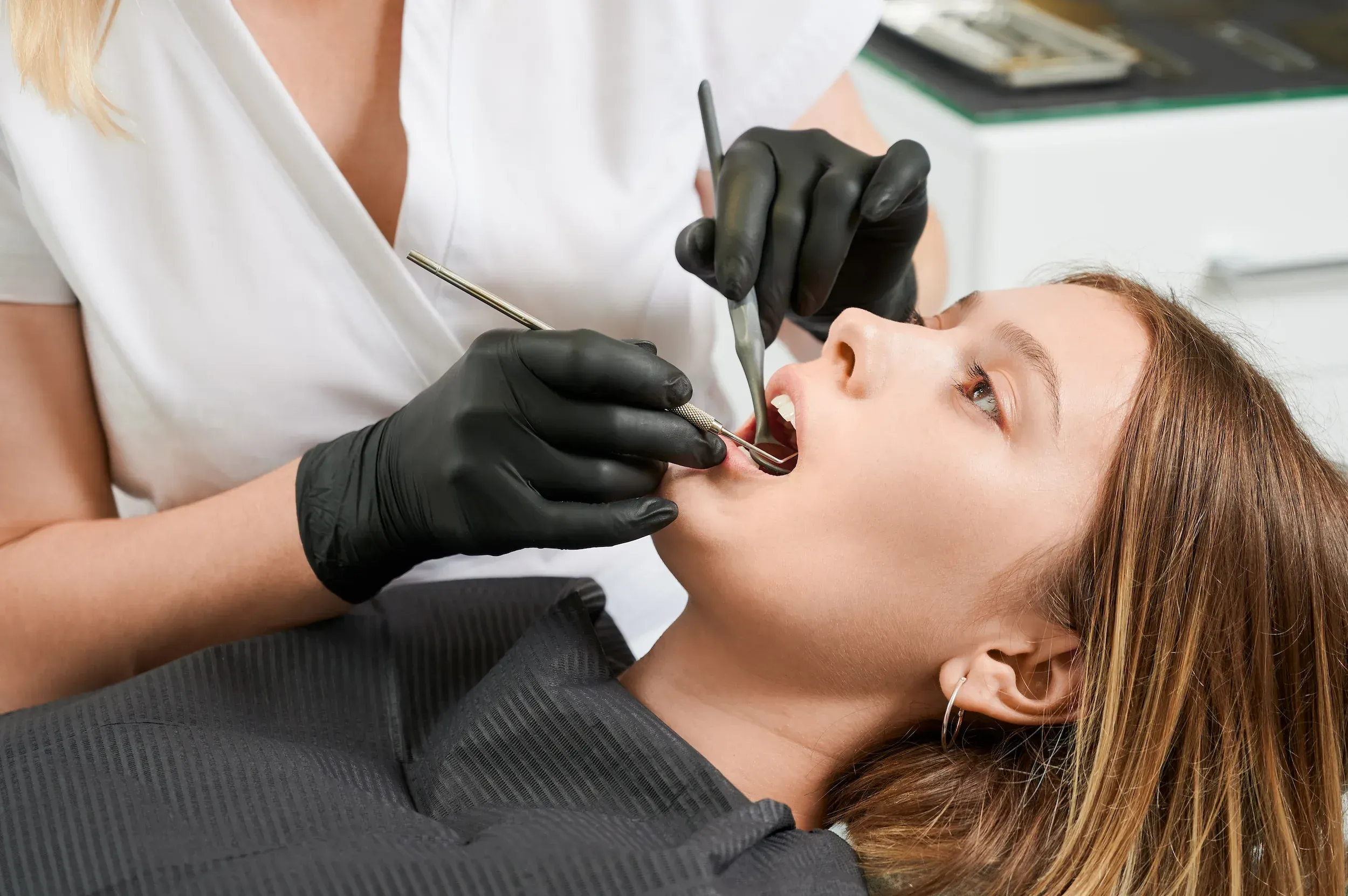 Patient relaxing in the dental chair before a gentle tooth extraction at Cook Family Dentistry