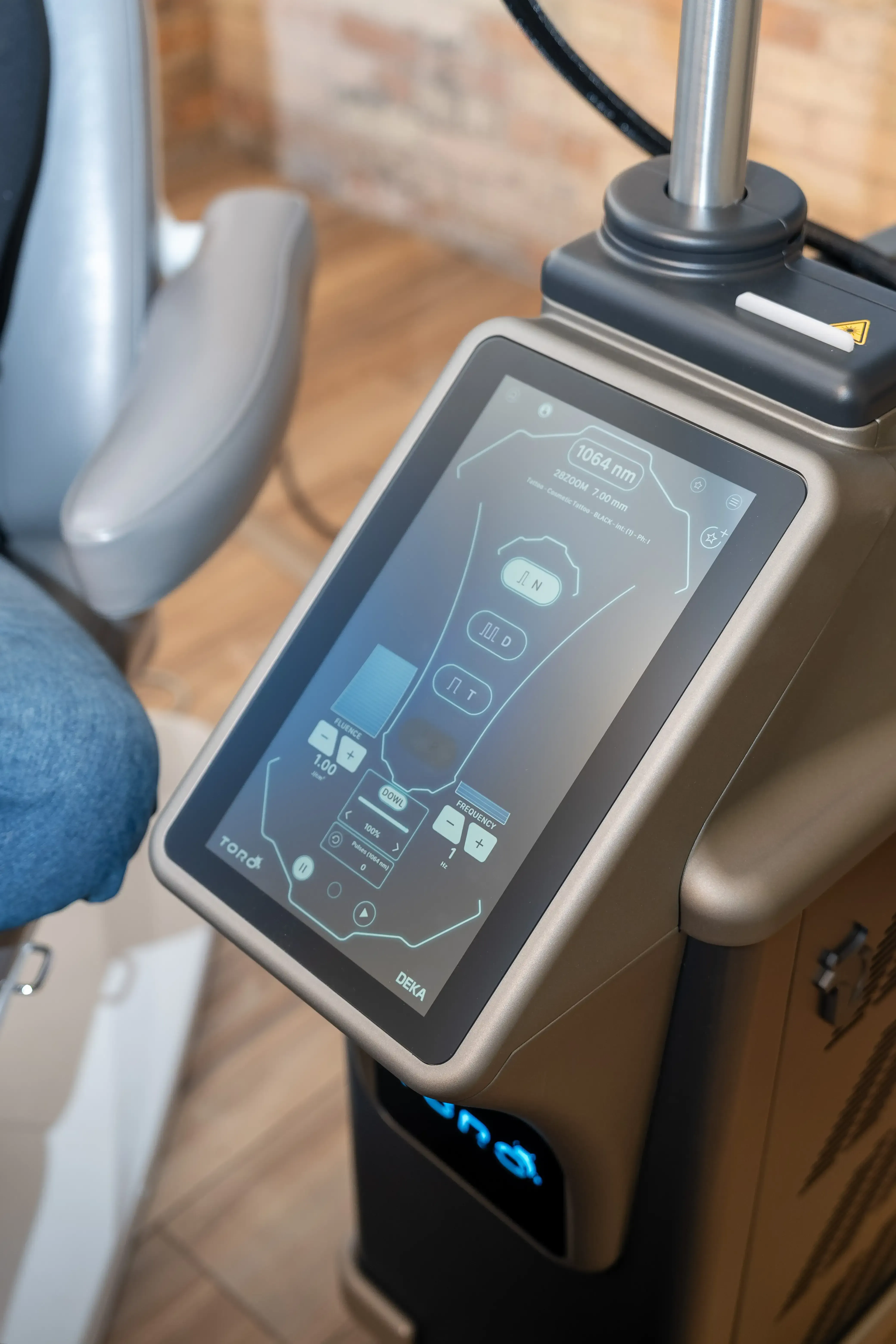 Patient consultation discussing Toro Laser treatment benefits at Eternal Wellness Medical Spa