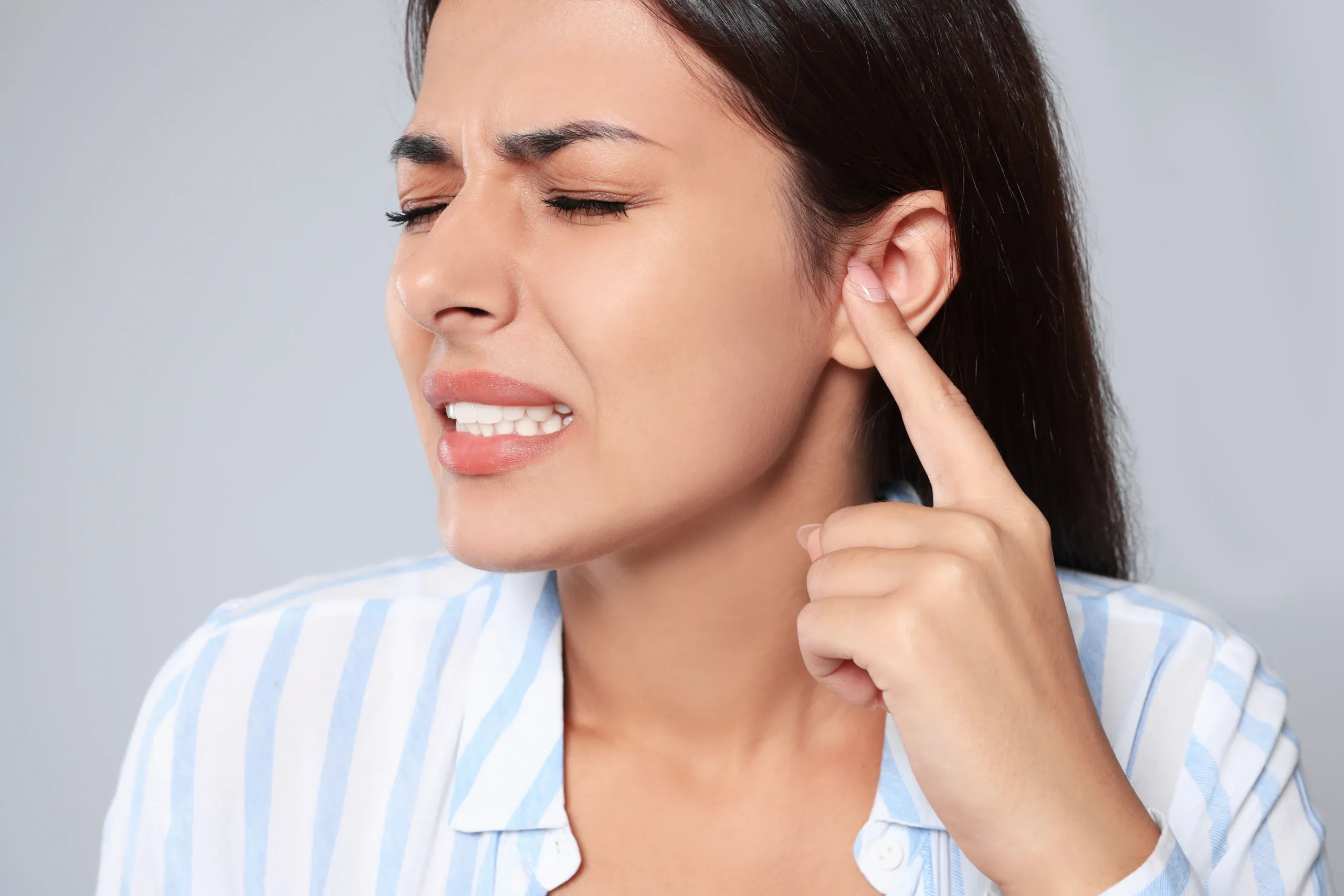 Person concerned about facial nerve pain at Physicians Ketamine Institute Destin