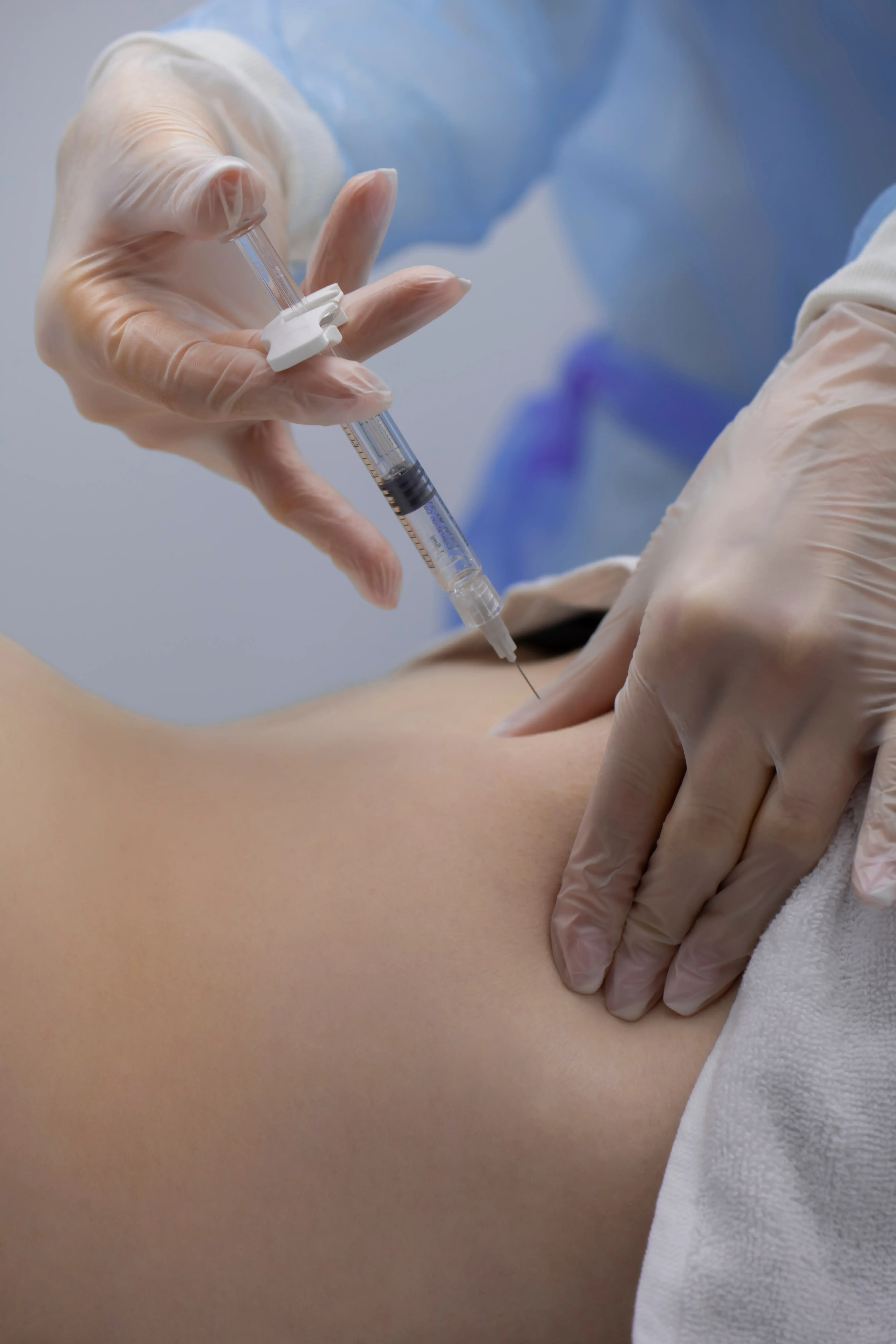 Patient consultation for trigger point injection therapy at West Eastern Health near Jacksonville