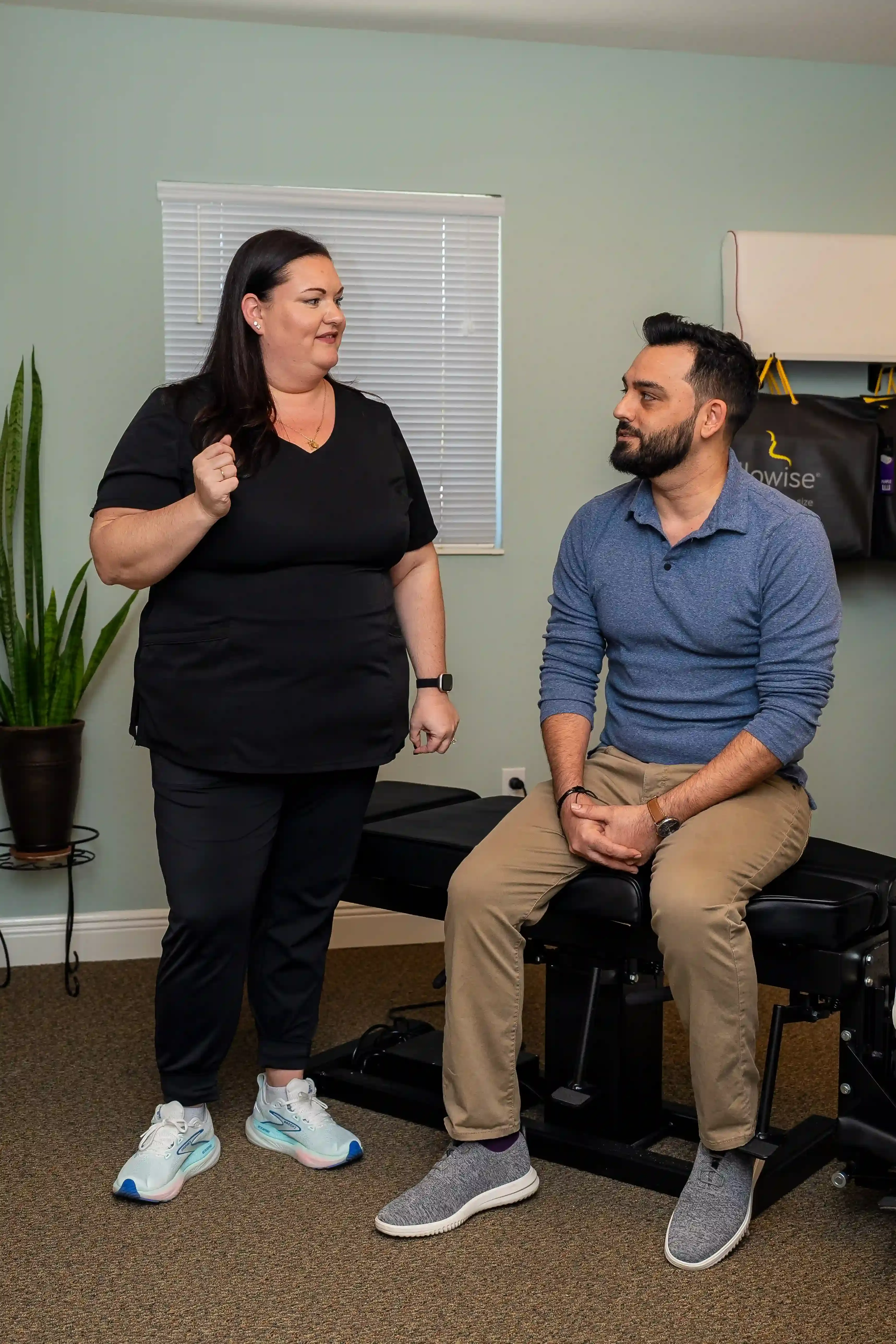 Patient consultation for upper cervical chiropractic at Arise Integrative Wellness Port Charlotte