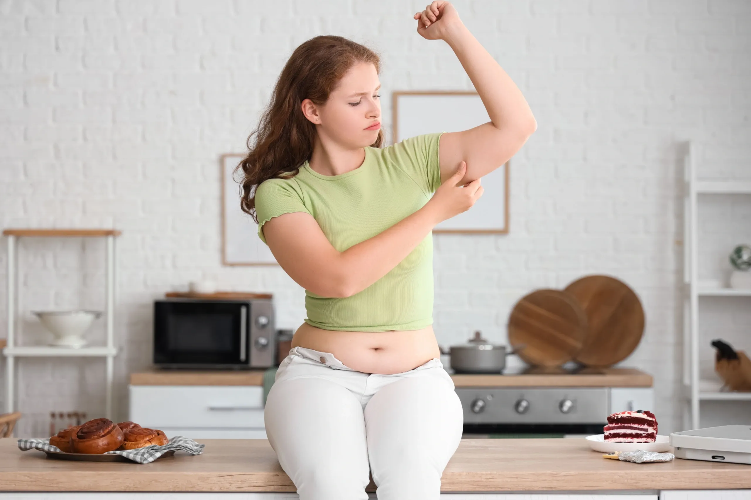 Person concerned about unexplained weight gain at WinMind Integrative Health