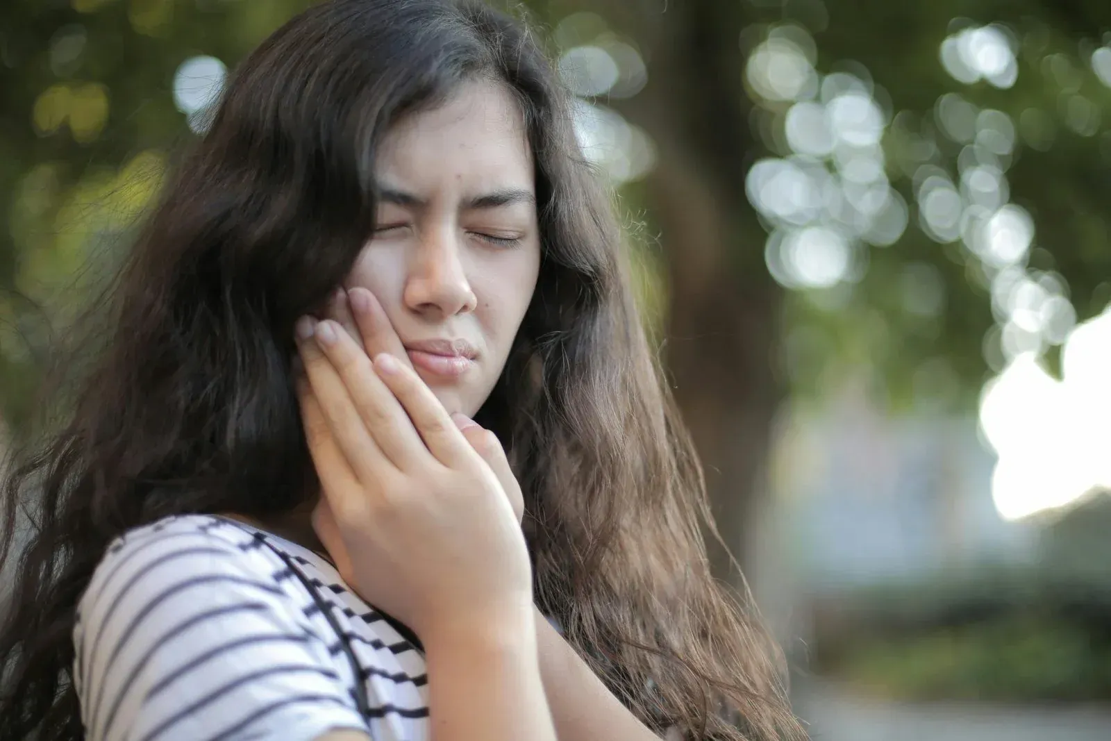 Calm young patient resting before wisdom teeth removal at Cook Family Dentistry in Santa Rosa Beach