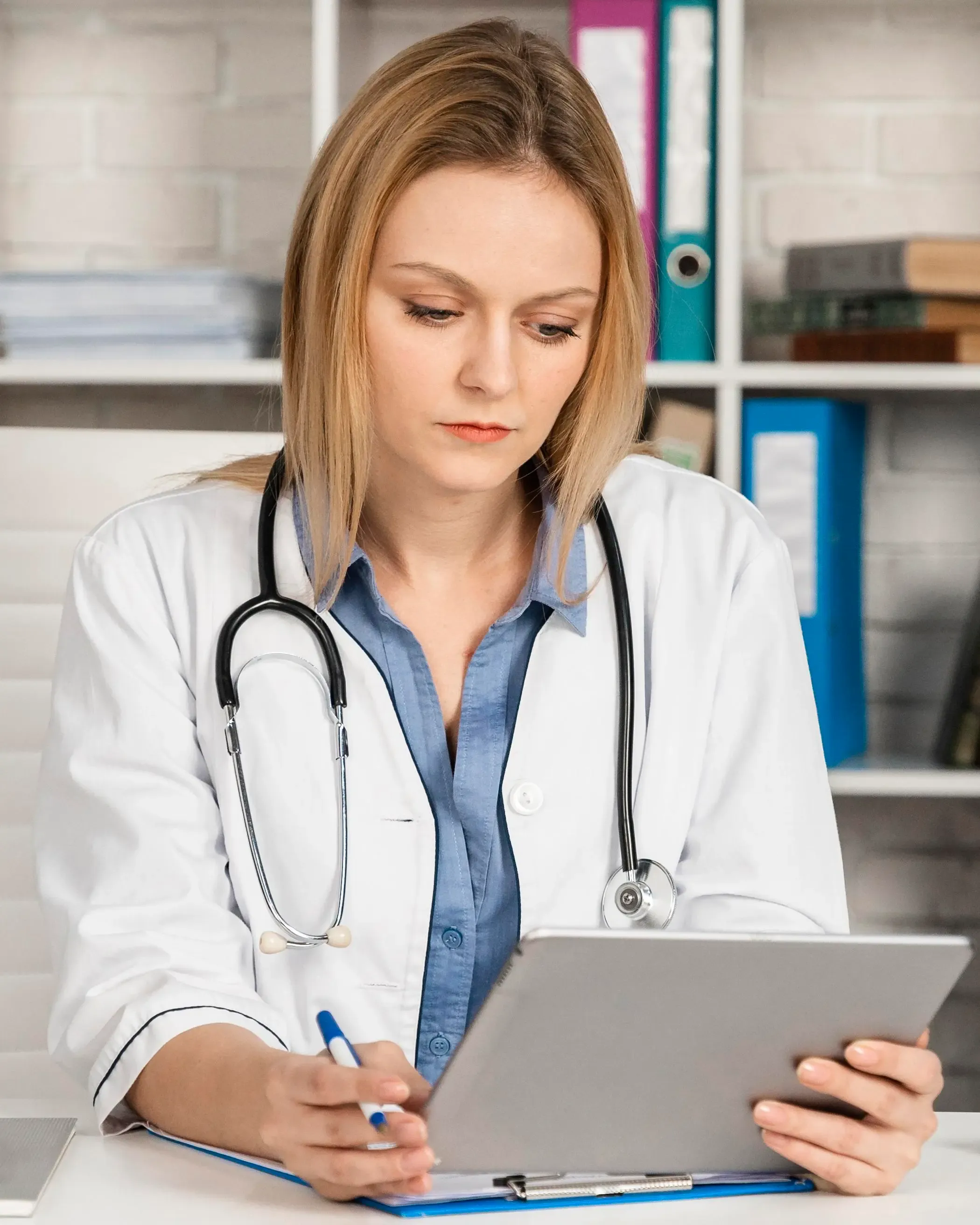 physician reviewing chronic condition treatment plan Venice FL