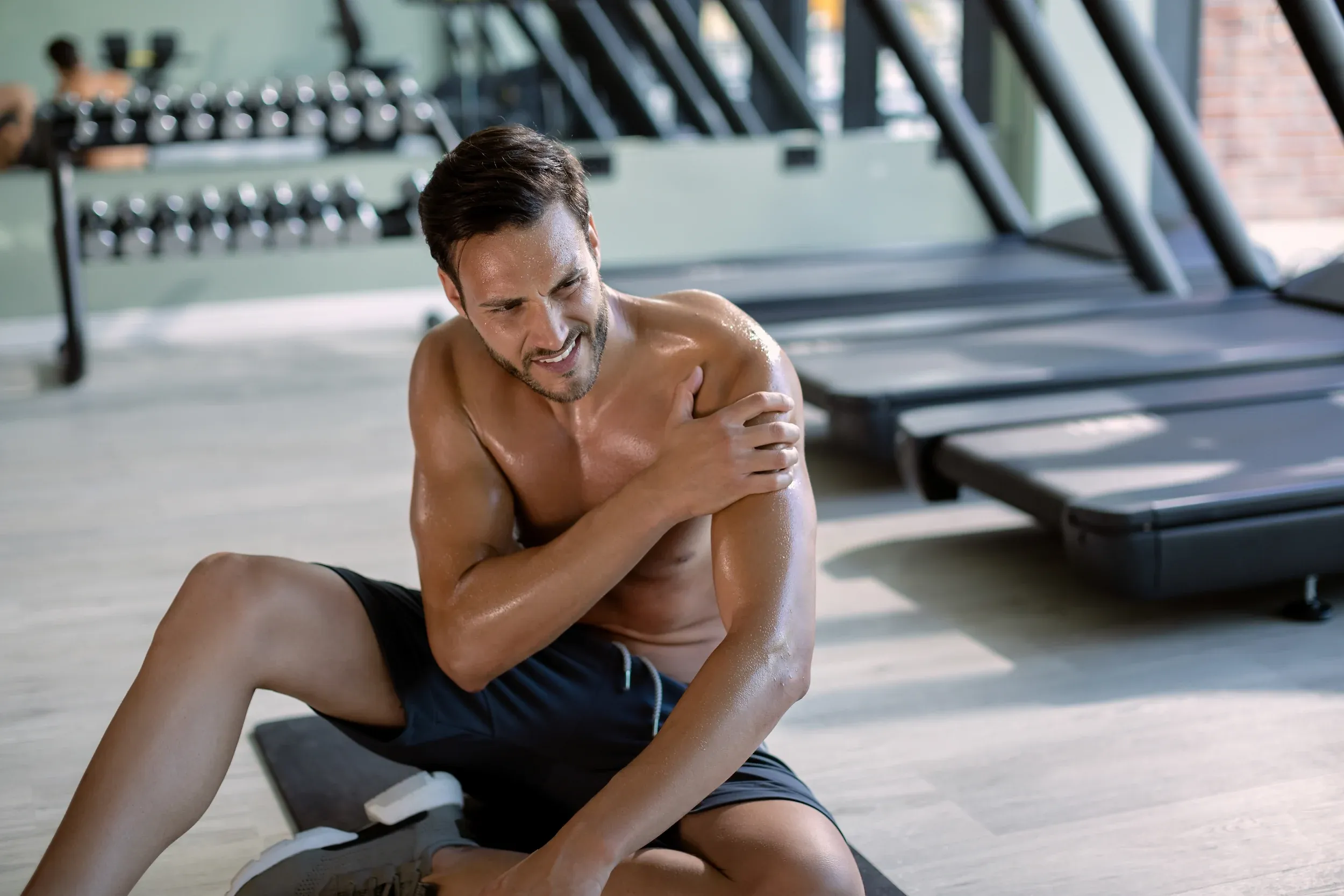 Adult patient discussing muscle loss concerns with Dr. Martens at Resurgent Health Fargo