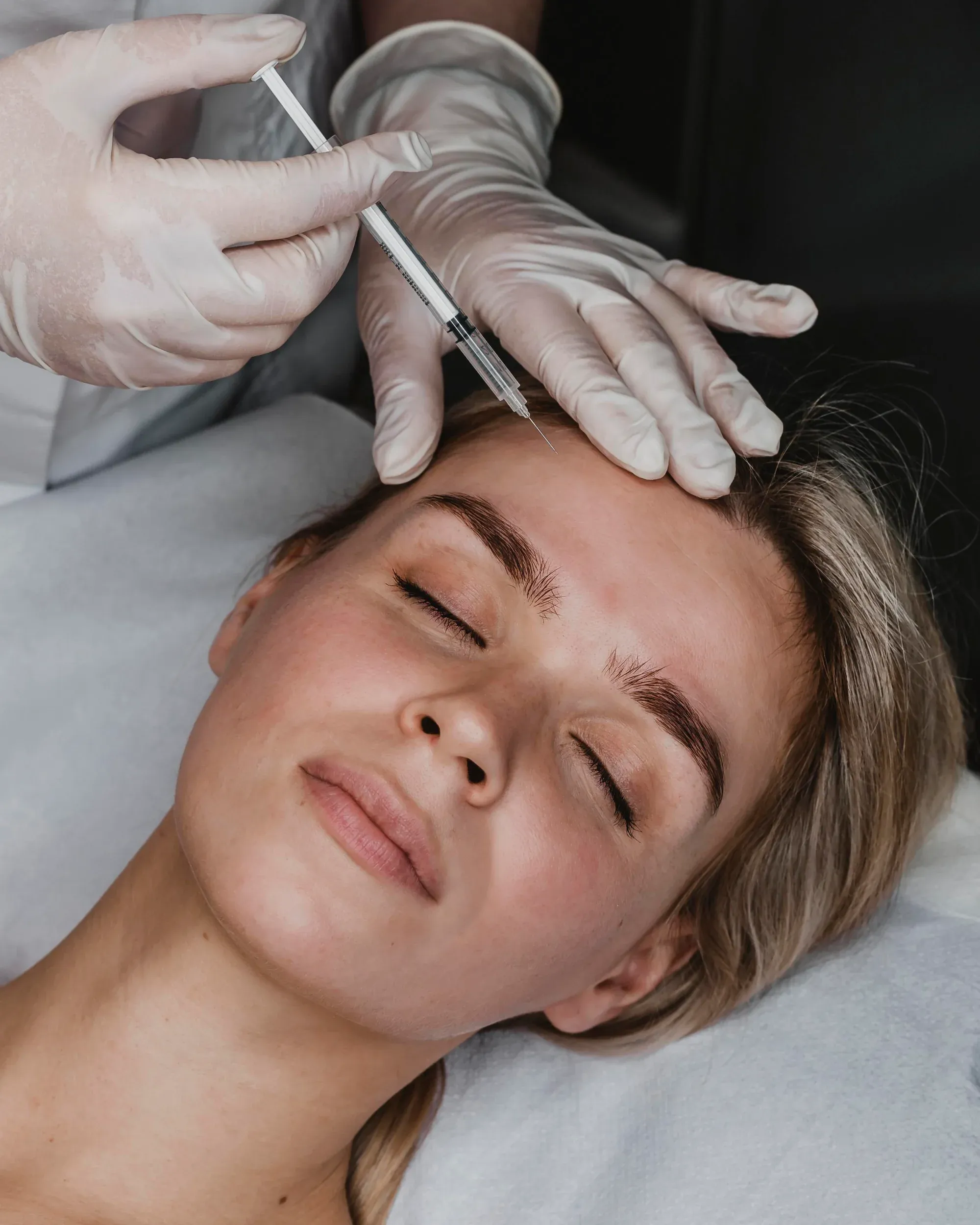 Confident patient after Xeomin consultation at Mint Aesthetics & Skin Indianapolis